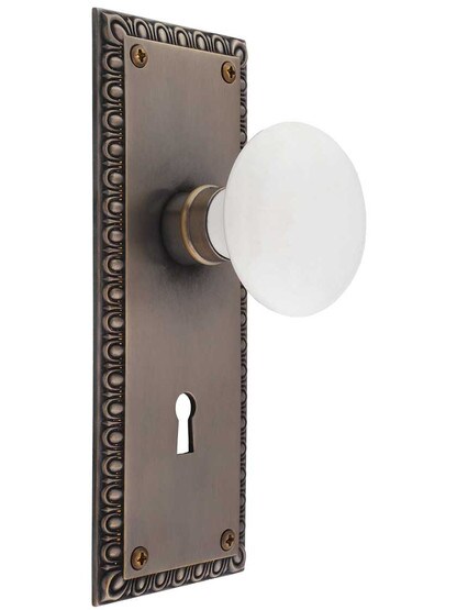 Ovolo Mortise-Lock Set with White Porcelain Knobs and Keyhole in Antique-by-Hand.