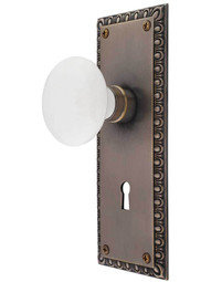 Ovolo Mortise-Lock Set with White Porcelain Knobs and Keyhole in Antique-by-Hand.
