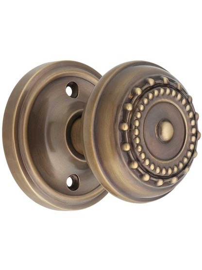Classic Rosette Door Set with Meadows Knobs in Antique-By-Hand.