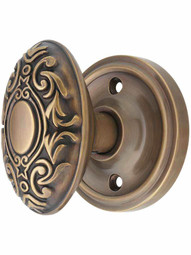 Classic Rosette Door Set with Decorative Oval Knobs in Antique-By-Hand.