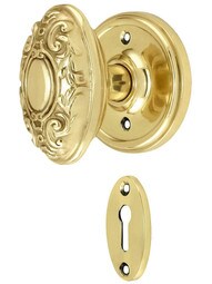 Classic Rosette Mortise Lock Set With Decorative Oval Knobs.