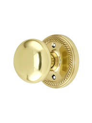 Rope Rosette Style Door Set With Round Brass Knobs.