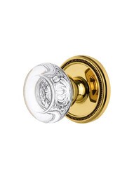 Grandeur Soleil Rosette Door Set with Bordeaux Crystal-Glass Knobs.