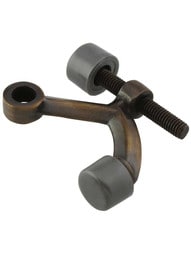 Solid Brass Hinge Pin Door Stop With Grey Bumpers in Antique-By-Hand