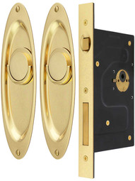 Moreland Pocket Door Mortise Lock Set with Oval Pulls.