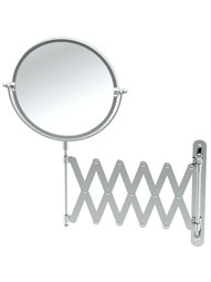 Retractable Wall-Mount Mirror - 7 1/2 inchDiameter.