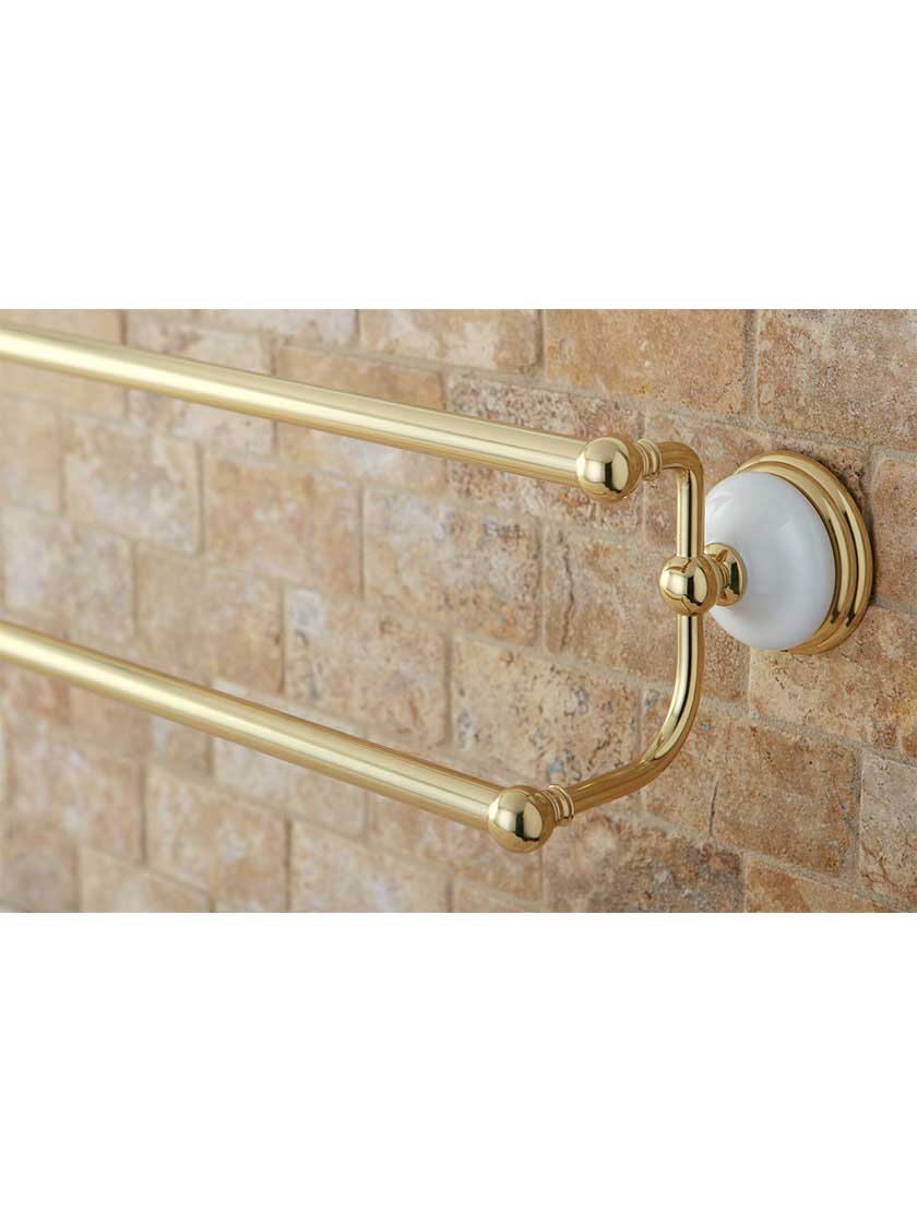 24" Cumberland Dual Towel Bar with Brass and White Porcelain Rosettes