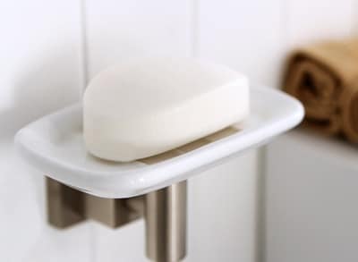 Bathroom sink soap dishes and toothbrush holders