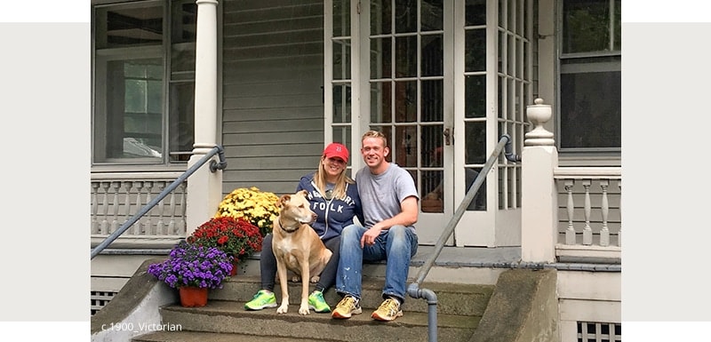 Kira and Adam on the porch pre-restoration