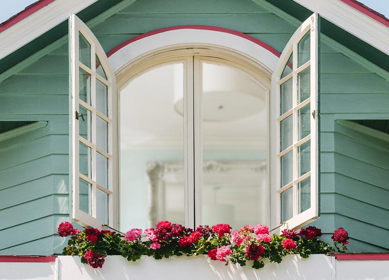 Pair of outswing casement windows with vintage casement hardware.