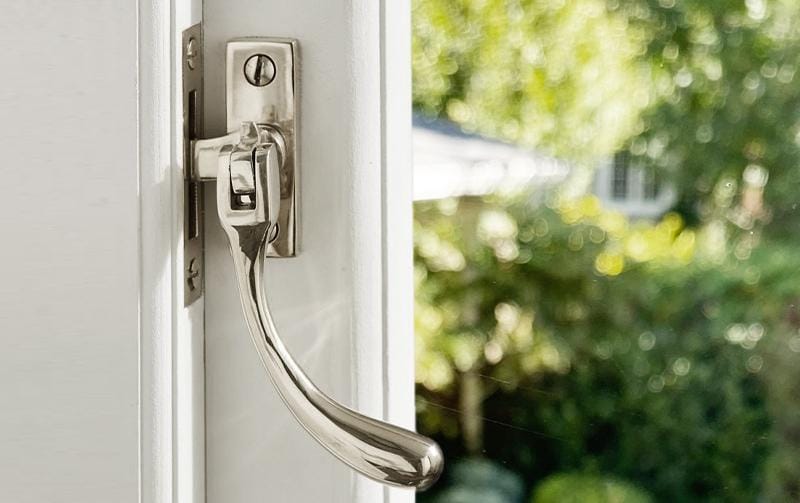 A pendant-style casement latch maintains a low profile.