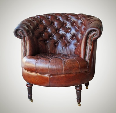 Leather club chair with stem casters