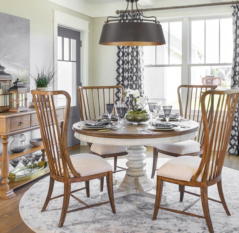 Traditional dining room with modern pendant