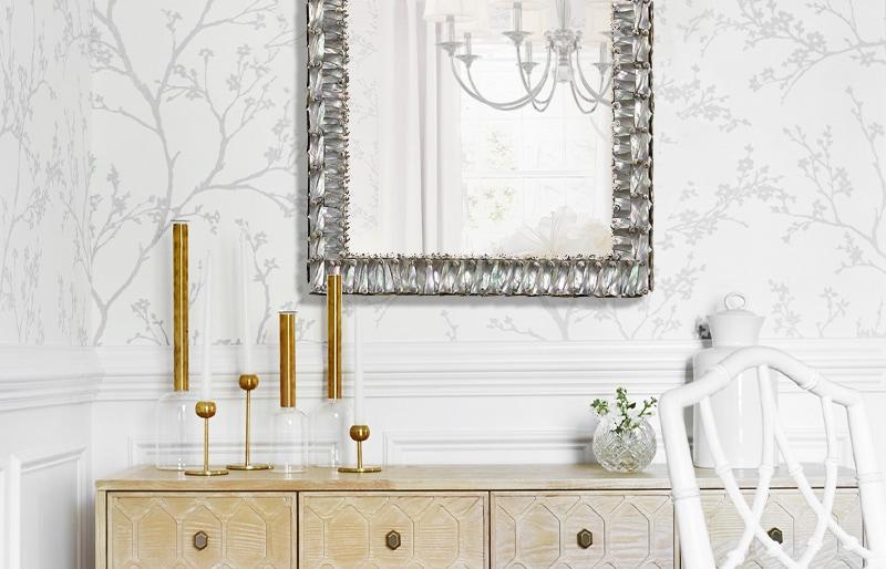 Decorative mirror over dining room sideboard