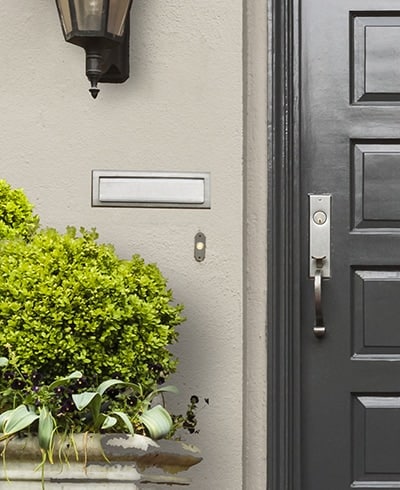 Satin-nickel mail slot mounted directly to wall