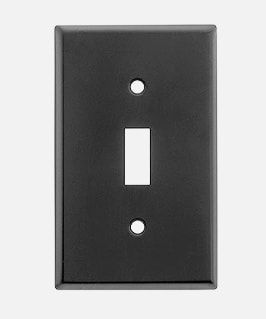 Pressed brass switch plate in matte black finish