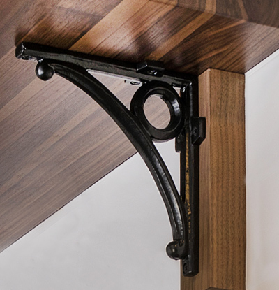 Create extra storage in your home office with iron shelf brackets