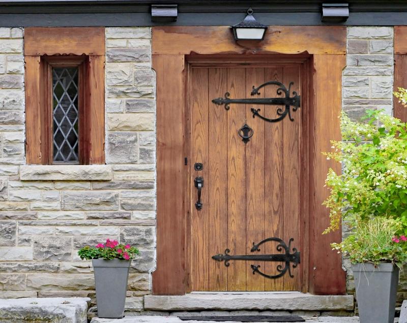 Entry door with English Gothic strap hinges